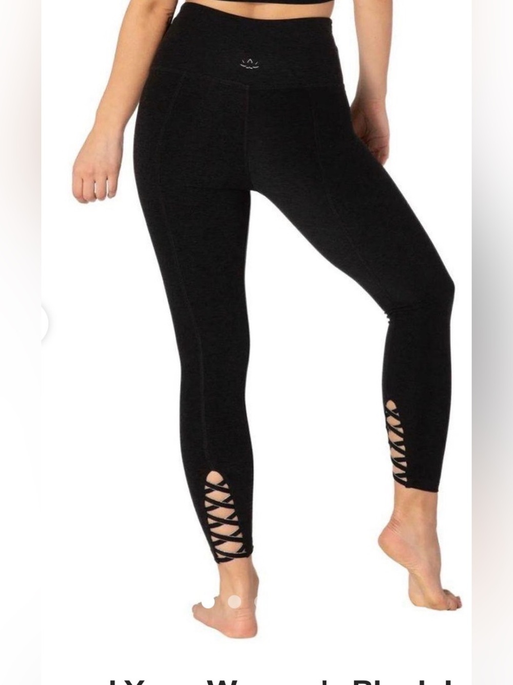 Beyond Yoga black leggings with cutout detail on the bottom size S